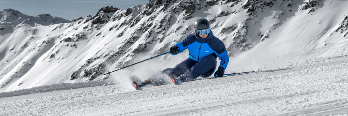 man skiing down a mountain